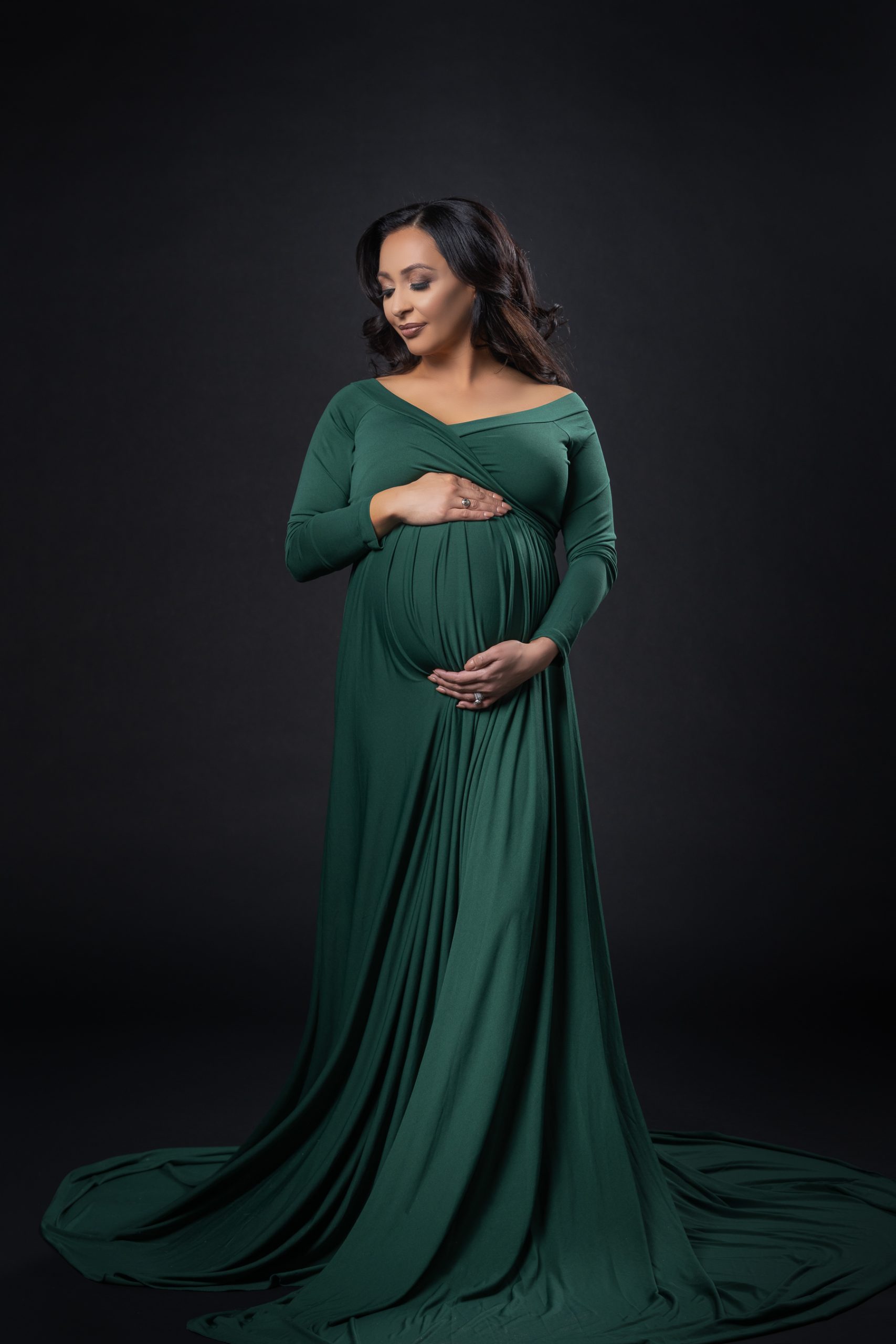 Maternity photography in green dress