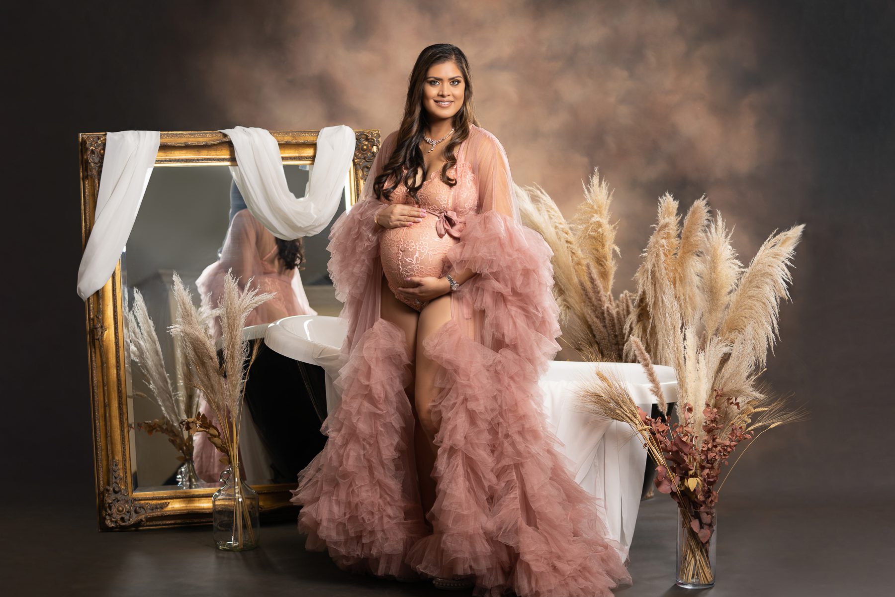 Maternity photography in beige dress