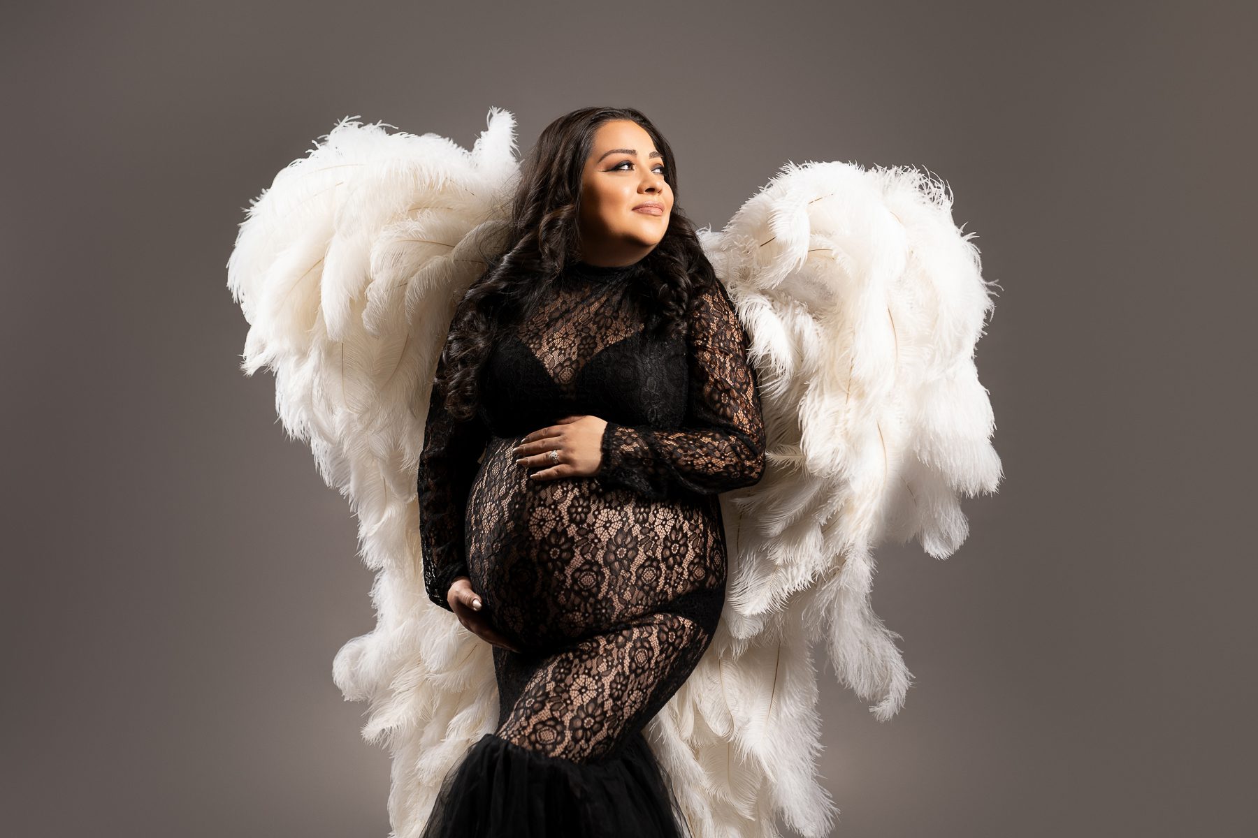 Maternity photo with angel wings